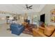 Spacious open-concept living area that combines a modern kitchen, dining area, and comfortable seating at 26636 Irwin Dr, Englewood, FL 34223