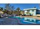 Enjoy the community pool with lounge chairs and a barbecue area perfect for outdoor fun and relaxation at 5055 N Beach Rd # 203, Englewood, FL 34223