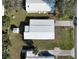An overhead aerial view of the home shows the roof and surrounding yard at 6347 Oriole Blvd, Englewood, FL 34224