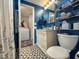 Stylish bathroom features vanity sink, patterned tile floors, and great lighting at 6347 Oriole Blvd, Englewood, FL 34224