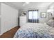 Bedroom featuring natural light, ceiling fan and hardwood floors at 6347 Oriole Blvd, Englewood, FL 34224