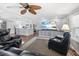 Bright living area connecting to a modern kitchen and dining space, perfect for seamless entertaining and daily living at 6347 Oriole Blvd, Englewood, FL 34224