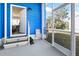 Exterior view of the porch featuring access to backyard and the inside of home at 6347 Oriole Blvd, Englewood, FL 34224