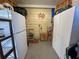 Functional storage room with ample shelving and storage units for organization at 6347 Oriole Blvd, Englewood, FL 34224