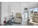 Bright sun room with comfortable seating and view of the outdoors at 6347 Oriole Blvd, Englewood, FL 34224