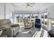 Bright sun room featuring comfortable seating and plenty of natural light at 6347 Oriole Blvd, Englewood, FL 34224
