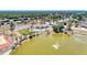 Beautiful aerial view of community pool, lake, and surrounding residences at 6522 Coliseum Blvd, Port Charlotte, FL 33981