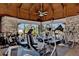 Community gym featuring treadmills, stationary bikes, and natural light from large windows at 6522 Coliseum Blvd, Port Charlotte, FL 33981