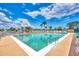 Relaxing community pool perfect for cooling off and enjoying the weather at 6522 Coliseum Blvd, Port Charlotte, FL 33981
