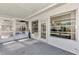 Spacious porch with large windows and glass doors for natural light and outdoor access at 6522 Coliseum Blvd, Port Charlotte, FL 33981