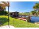 Exterior view of wooden deck on waterfront at 8243 Pinetree Ln, Englewood, FL 34224