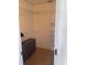 Walk-in closet offering generous storage space with shelving for optimal organization at 8937 Bantry Bay Blvd, Englewood, FL 34224