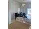 Bright dining area features a modern ceiling fan, tile floors, and an open floor plan for easy entertaining at 8937 Bantry Bay Blvd, Englewood, FL 34224