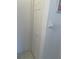 Hallway closet door against a white wall, providing practical storage for coats, shoes, and linens at 8937 Bantry Bay Blvd, Englewood, FL 34224