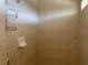 Tiled shower with built-in shelving and a shower head for a refreshing experience at 8937 Bantry Bay Blvd, Englewood, FL 34224