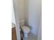 Clean and modern toilet in a well-maintained bathroom with neutral-colored tile flooring at 8937 Bantry Bay Blvd, Englewood, FL 34224