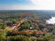 Expansive aerial view of a property featuring mature trees and a rural setting at 9094 Preston Rd, Brooksville, FL 34601