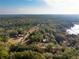 Expansive aerial view of a property featuring mature trees and a rural setting at 9094 Preston Rd, Brooksville, FL 34601