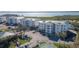 Scenic condos feature lush landscaping, tennis court, ample parking, and views of the bay at 9203 Griggs Rd # 301, Englewood, FL 34224
