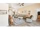 Cozy living room with neutral color palette, comfortable seating, and view of the front entrance at 118 Albatross Rd, Rotonda West, FL 33947