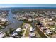 A waterfront property on a canal boasts a private boat dock with gulf access at 1918 Greenlawn Dr, Englewood, FL 34223