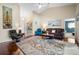 Bright living room with vaulted ceilings, hardwood floors and an open layout at 194 Sunset Rd, Rotonda West, FL 33947