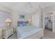 Comfortable bedroom with a queen bed and en suite bath at 934 Rotonda Cir, Rotonda West, FL 33947