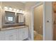 Double vanity bathroom with granite countertops and a toilet at 1314 E Knollwood St, Tampa, FL 33604