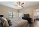 Spacious Primary bedroom with a king-size bed and access to backyard at 1314 E Knollwood St, Tampa, FL 33604