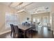 Modern dining room with dark hardwood floors and a chandelier at 1314 E Knollwood St, Tampa, FL 33604