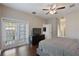 Spacious main bedroom with a king-size bed and backyard access at 1314 E Knollwood St, Tampa, FL 33604