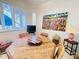 Casual breakfast nook with granite table and wicker chairs at 1108 Bayhead Ln, Osprey, FL 34229