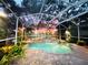 Inviting screened pool area with a tranquil water feature at 1108 Bayhead Ln, Osprey, FL 34229