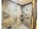 Large walk-in shower with grab bars and built-in shelving at 1108 Bayhead Ln, Osprey, FL 34229