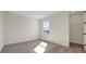 Bedroom with neutral carpet and a window at 9039 Duany Ln, Lakewood Ranch, FL 34240