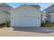 A beautiful view of the house with a large 2 car garage at 9039 Duany Ln, Lakewood Ranch, FL 34240