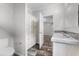 Bright bathroom with a double vanity and additional storage cabinets at 2044 Culbreath Rd, Brooksville, FL 34601