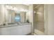 Bathroom with double vanity and walk-in shower at 13837 Messina Loop # 204, Bradenton, FL 34211