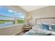 Bedroom with water views and sitting area at 13837 Messina Loop # 204, Bradenton, FL 34211