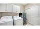 Laundry room with washer, dryer, and wine cooler at 13837 Messina Loop # 204, Bradenton, FL 34211