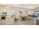 Open concept living area with kitchen, dining, and living room at 13837 Messina Loop # 204, Bradenton, FL 34211