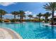 Large resort-style pool with multiple cabanas and lounge chairs at 13837 Messina Loop # 204, Bradenton, FL 34211