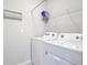 Laundry room with washer and dryer, and shelving at 24692 Rio Villa Lakes Cir, Punta Gorda, FL 33950