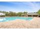 Community pool with lounge chairs and a clear view at 813 Old Windsor Way, Spring Hill, FL 34609