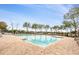 Community pool with lounge chairs and a clear view at 813 Old Windsor Way, Spring Hill, FL 34609