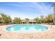 Community pool with lounge chairs and a clear view at 813 Old Windsor Way, Spring Hill, FL 34609