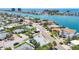 Aerial view of waterfront home and neighborhood at 8701 Gulf Blvd, St Pete Beach, FL 33706