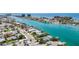 Aerial view of waterfront home and neighborhood at 8701 Gulf Blvd, St Pete Beach, FL 33706