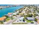 Aerial view of waterfront home and neighborhood at 8701 Gulf Blvd, St Pete Beach, FL 33706