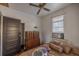 Simple bedroom with window, ceiling fan and closet at 11317 Salina St, Brooksville, FL 34614